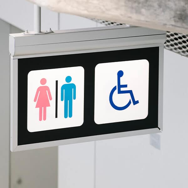 Das Bild zeigt eine Toiletten Schild.